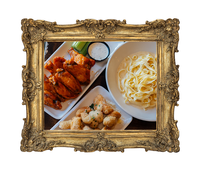 a framed photo of a plate of food on a table - Camps Kitchen & Bar, Marietta, GA